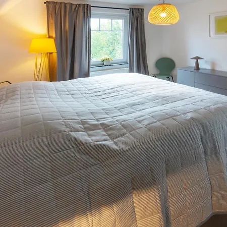 Deichhaus- Gartenwohnung شقة